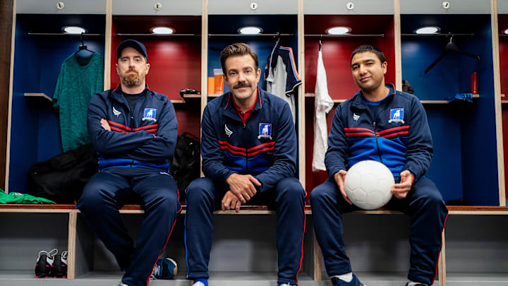 Brendan Hunt, Jason Sudeikis and Nick Mohammed in “Ted Lasso” season two, now streaming on Apple TV+.