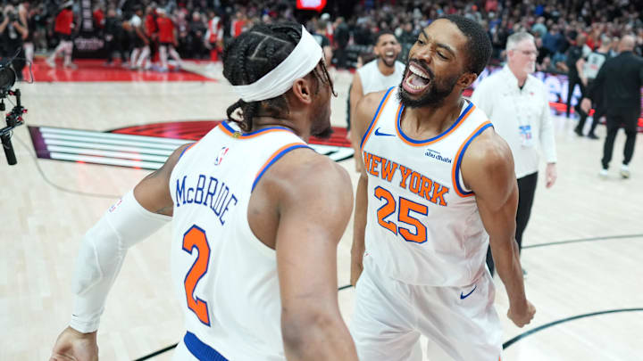Mar 12, 2025; Portland, Oregon, USA; New York Knicks small forward Mikal Bridges (25) celebrates with point guard Miles McBride (2) after the game against the Portland Trail Blazers at Moda Center. Mandatory Credit: Soobum Im-Imagn Images