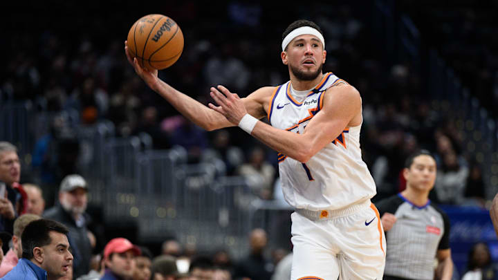 Jan 16, 2025; Washington, District of Columbia, USA; Phoenix Suns guard Devin Booker (1) grabs a loose ball during the fourth quarter against the Washington Wizards at Capital One Arena. Mandatory Credit: Reggie Hildred-Imagn Images Jan 16, 2025; Washington, District of Columbia, USA; Phoenix Suns guard Devin Booker (1) grabs a loose ball during the fourth quarter against the Washington Wizards at Capital One Arena. Mandatory Credit: Reggie Hildred-Imagn Images