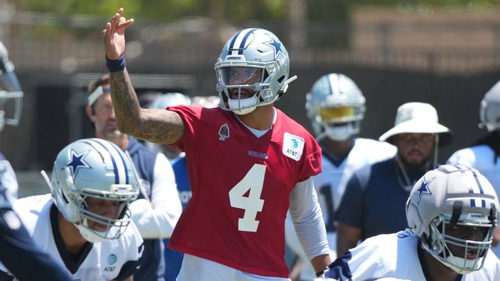 Dallas Cowboys quarterback Dak Prescott takes the snap at training camp at River Ridge Playing Fields. Dallas Cowboys quarterback Dak Prescott takes the snap at training camp at River Ridge Playing Fields.