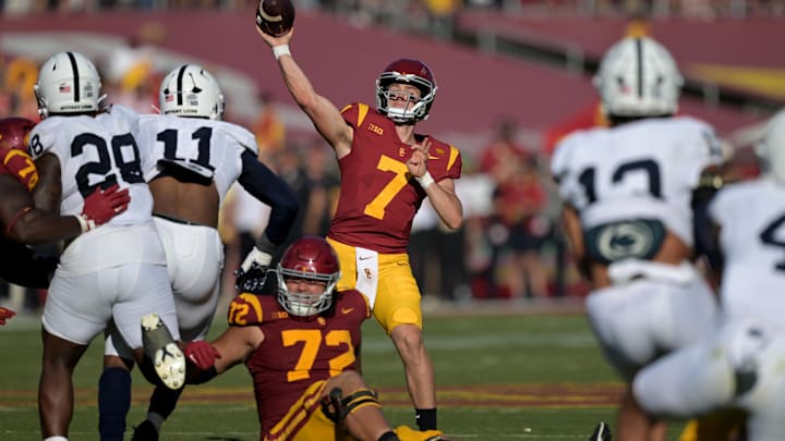 Oct 12, 2024; Los Angeles, California, USA; USC Trojans quarterback Miller Moss (7) throws a pass against the Penn State Nittany Lions at United Airlines Field at Los Angeles Memorial Coliseum. Mandatory Credit: Jayne Kamin-Oncea-Imagn Images