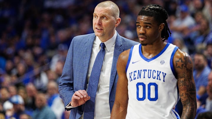 Feb 8, 2025; Lexington, Kentucky, USA; Kentucky Wildcats head coach Mark Pope talks with guard Otega Oweh (00) during the second half against the South Carolina Gamecocks at Rupp Arena at Central Bank Center. Mandatory Credit: Jordan Prather-Imagn Images