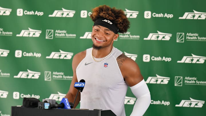 Jul 23, 2025; Florham Park, NY, USA; New York Jets quarterback Justin Fields (7) speaks at a press conference during training camp at Atlantic Health Jets Training Center. Mandatory Credit: John Jones-Imagn Images