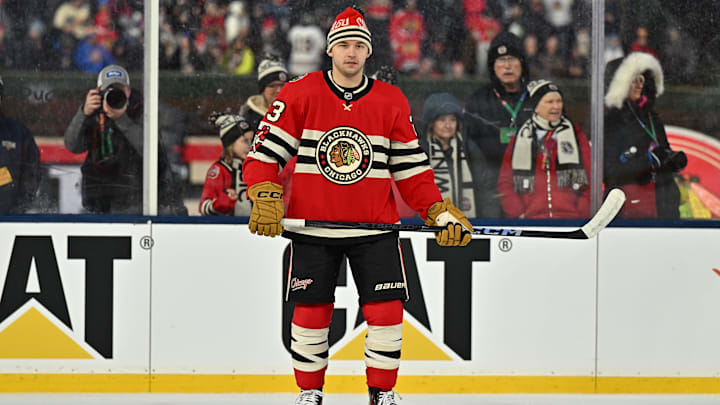  Dec 31, 2024; Chicago, Illinois, USA; Chicago Blackhawks center Philipp Kurashev (23) looks on during warmups before the Winter Classic against the St. Louis Blues at Wrigley Field. Mandatory Credit: Daniel Bartel-Imagn Images