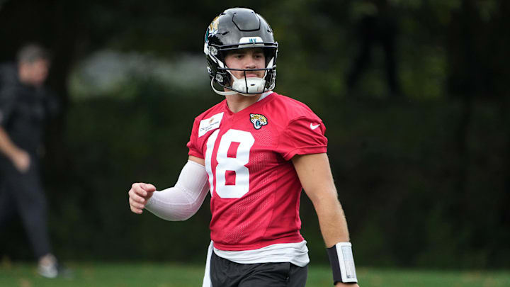 Oct 16, 2024; Watford, United Kingdom; Jacksonville Jaguars quarterback John Rhys Plumlee (18) during practice at The Grove. Mandatory Credit: Kirby Lee-Imagn Images
