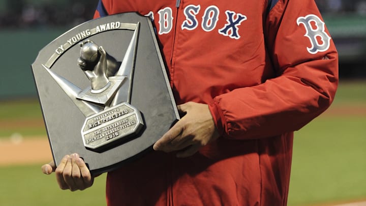 Apr 5, 2017; Boston, MA, USA; Boston Red Sox starting pitcher Rick Porcello (22) is honored with the Cy Young Award prior to a game against the Pittsburgh Pirates at Fenway Park. Mandatory Credit: Bob DeChiara-Imagn Images