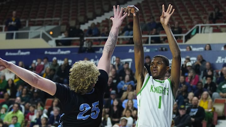 St. Mary's forward Cameron Williams (1) shoots against Deer Valley center Carter Guggenberger (25) during the 4A state championship at Arizona Veterans Memorial Coliseum in Phoenix on March 6, 2025.