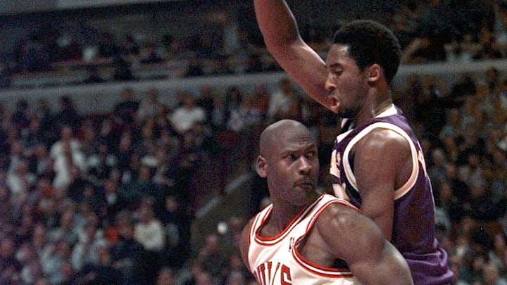 December 17, 1997; Chicago, IL;Chicago's Michael Jordan  (23), bottom, is guarded by LA's Kobe Bryant (8) in the second half. 