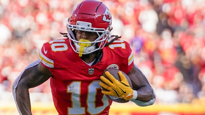 Sep 28, 2025; Kansas City, Missouri, USA; Kansas City Chiefs running back Isiah Pacheco (10) runs the ball against the Baltimore Ravens during the game at GEHA Field at Arrowhead Stadium.