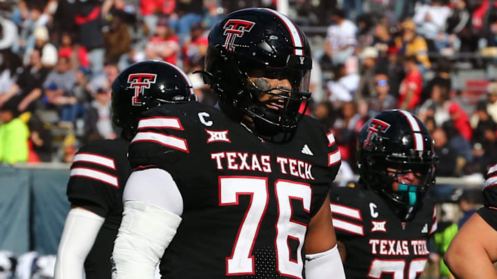 Nov 30, 2024; Lubbock, Texas, USA;  Texas Tech Red Raiders offensive tackle Caleb Rogers (76) in the second half during the game against the West Virginia Mountaineers at Jones AT&T Stadium and Cody Campbell Field. Mandatory Credit: Michael C. Johnson-Imagn Images