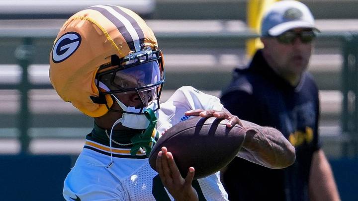 Green Bay Packers receiver Matthew Golden (0) catches a pass during practice at minicamp. Green Bay Packers receiver Matthew Golden (0) catches a pass during practice at minicamp.