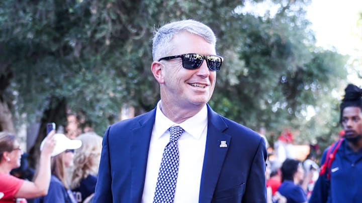 Aug 30, 2025; Tucson, Arizona, USA; Arizona Wildcats head coach Brent Brennan walks down the Wildcat Walk before the start of the game against the Hawaii Rainbow Warriors at Arizona Stadium. Mandatory Credit: Aryanna Frank-Imagn Images
