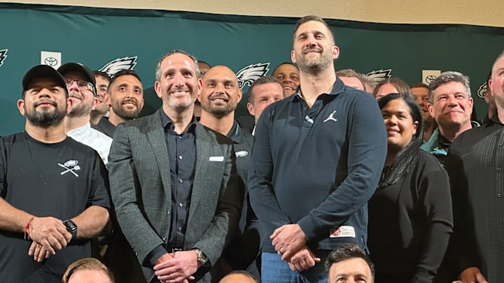 Eagles GM Howie Roseman and head coach Nick Sirianni with members of the organization after the 2025 NFL Draft. 