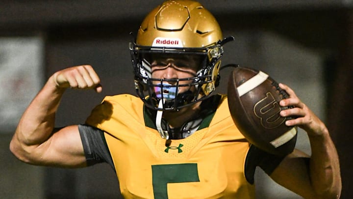Brogan McNab of Melbourne Central Catholic celebrates a touchdown against Melbourne during a three team spring football jamboree Friday, May 224 2024 at Melbourne High School.. Craig Bailey/FLORIDA TODAY via USA TODAY NETWORK