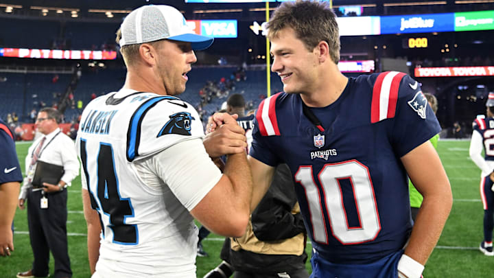 Aug 8, 2024; Foxborough, Massachusetts, USA; New England Patriots quarterback Drake Maye (10) high-fives Carolina Panthers long snapper JJ Jansen (44) after a game at Gillette Stadium.
