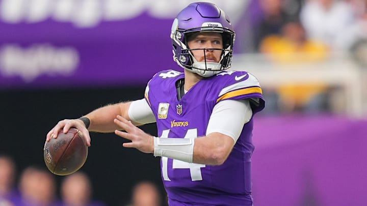Dec 1, 2024; Minneapolis, Minnesota, USA; Minnesota Vikings quarterback Sam Darnold (14) passes against the Arizona Cardinals in the second quarter at U.S. Bank Stadium. Dec 1, 2024; Minneapolis, Minnesota, USA; Minnesota Vikings quarterback Sam Darnold (14) passes against the Arizona Cardinals in the second quarter at U.S. Bank Stadium.