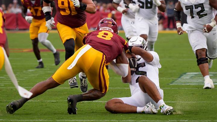 USC's Desman Stephens has been suspended for this late hit on Oregon quarterback Dante Moore.