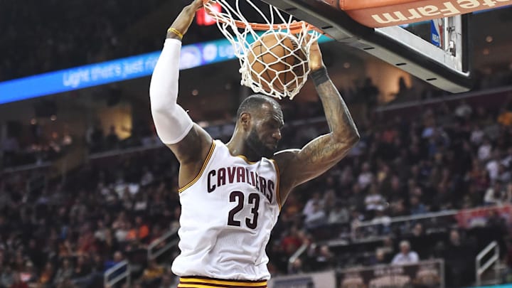 Apr 4, 2017; Cleveland, OH, USA; Cleveland Cavaliers forward LeBron James (23) slam dunks during the second half against the Orlando Magic at Quicken Loans Arena. The Cavs won 122-102. Mandatory Credit: Ken Blaze-Imagn Images