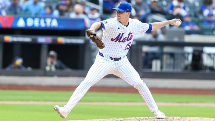 Mar 31, 2024; New York City, New York, USA;  New York Mets relief pitcher Brooks Raley (25) pitches in the ninth inning against the Milwaukee Brewers at Citi Field. Mandatory Credit: Wendell Cruz-Imagn Images
