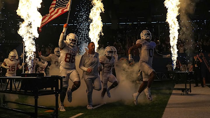 Texas Longhorns head coach Steve Sarkisian leads his team onto the field for the Sugar Bowl College Football Playoff semifinals game against the Washington Huskies at the Caesars Superdome on Monday, Jan. 1, 2024 in New Orleans, Louisiana. Texas Longhorns head coach Steve Sarkisian leads his team onto the field for the Sugar Bowl College Football Playoff semifinals game against the Washington Huskies at the Caesars Superdome on Monday, Jan. 1, 2024 in New Orleans, Louisiana.