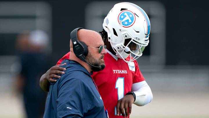 Tennessee Titans quarterback Cam Ward (1) talks with Offensive Coordinator Brian Daboll during OTAs at Vanderbilt Health Football Center in Nashville, Tenn., Monday, June 8, 2026.