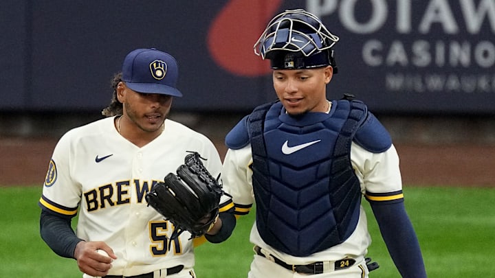 Milwaukee Brewers starting pitcher Freddy Peralta (51) and catcher William Contreras (24) talk during the first inning of their game against the New York Mets Monday, April 3, 2023, at American Family Field in Milwaukee, Wis. Milwaukee Brewers starting pitcher Freddy Peralta (51) and catcher William Contreras (24) talk during the first inning of their game against the New York Mets Monday, April 3, 2023, at American Family Field in Milwaukee, Wis.