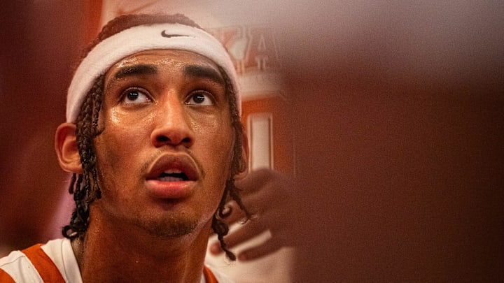 Texas Longhorns forward Devon Pryor (22) listens to coaching during a timeout in the second half of the Longhorns' game against the Chicago State Cougars at the Moody Center in Austin, Nov. 12, 2024.