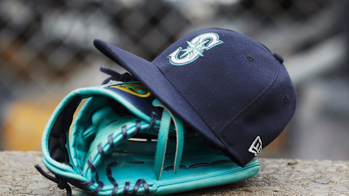 May 12, 2018; Detroit, MI, USA; Hat and glove of Seattle Mariners center fielder Dee Gordon (9) sits in dugout during the third inning against the Detroit Tigers at Comerica Park. Mandatory Credit: Rick Osentoski-Imagn Images