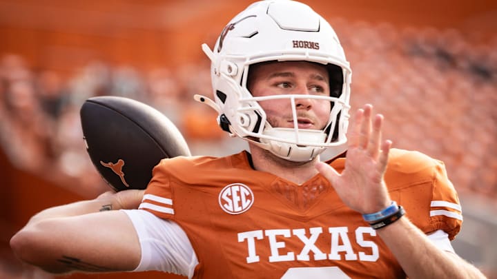 Texas Longhorns quarterback Quinn Ewers (3) warms up ahead of the Longhorns' game against the UTSA Roadrunners at Darrell K RoyalÐTexas Memorial Stadium, Saturday, Sept. 14, 2024.