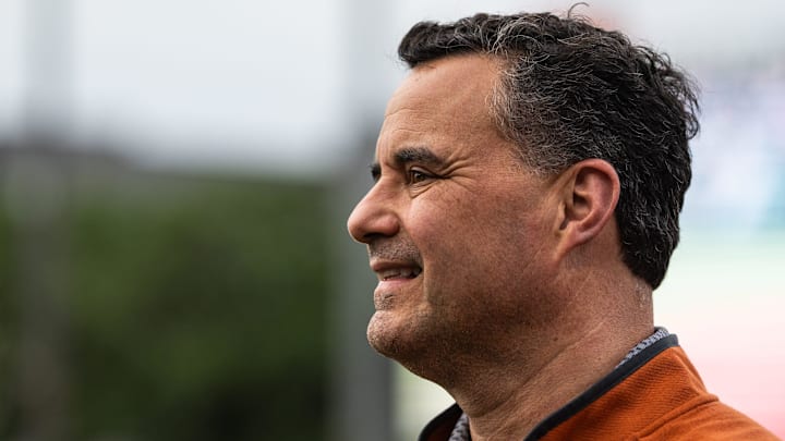 Texas Basketball coach Sean Miller watches warm-ups as the Longhorns prepare to take on the Auburn Tigers in the first game of a three-game series on Thursday night at UFCU Disch-Falk Field in Austin, April 17, 2025. Texas Basketball coach Sean Miller watches warm-ups as the Longhorns prepare to take on the Auburn Tigers in the first game of a three-game series on Thursday night at UFCU Disch-Falk Field in Austin, April 17, 2025.