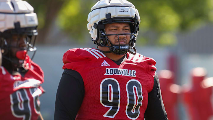 Louisville defensive lineman Jermayne Lole participates in drills on the first day of football Louisville defensive lineman Jermayne Lole participates in drills on the first day of football