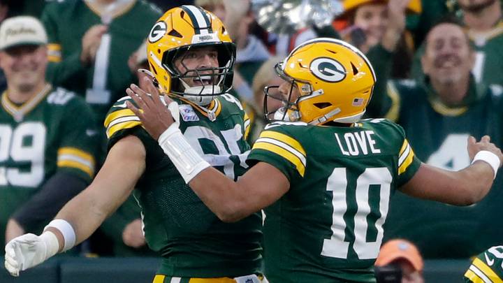 Oct 12, 2025; Green Bay, Wisconsin, USA; Green Bay Packers tight end Tucker Kraft (85) and quarterback Jordan Love (10) celebrate a fourth quarter touchdown against the Cincinnati Bengals during the game at Lambeau Field. Mandatory Credit: William Glasheen-USA TODAY Network via Imagn Images