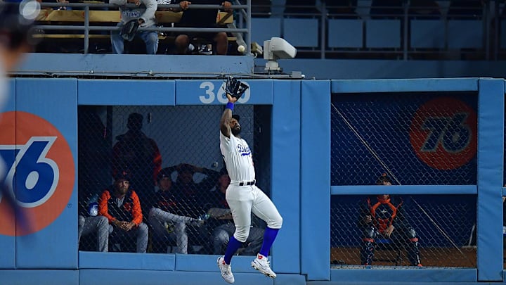 Sep 19, 2023; Los Angeles, California, USA; Los Angeles Dodgers right fielder Jason Heyward (23) catches the fly ball of Detroit Tigers center fielder Parker Meadows (22) during the seventh inning at Dodger Stadium. Mandatory Credit: Gary A. Vasquez-Imagn Images Sep 19, 2023; Los Angeles, California, USA; Los Angeles Dodgers right fielder Jason Heyward (23) catches the fly ball of Detroit Tigers center fielder Parker Meadows (22) during the seventh inning at Dodger Stadium. Mandatory Credit: Gary A. Vasquez-Imagn Images
