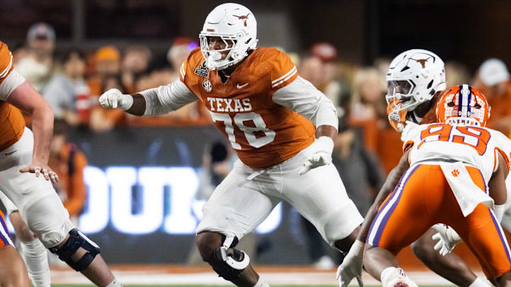 Kelvin Banks throws a block last season for Texas. He's a potential first-rounder but is he good enough to take 10th?