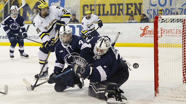 March 8, 2025; Ann Arbor, Michigan, USA; Penn State goalie Arsenii Sergeev (35) makes a save during the third period of the game against the Michigan Wolverines at Yost Ice Arena.