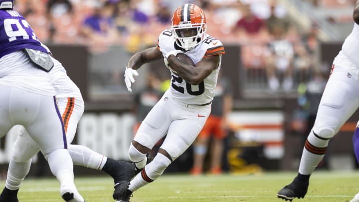 Aug 17, 2024; Cleveland, Ohio, USA; Cleveland Browns running back Pierre Strong Jr. (20) runs the ball against the Minnesota Vikings during the first quarter at Cleveland Browns Stadium. Aug 17, 2024; Cleveland, Ohio, USA; Cleveland Browns running back Pierre Strong Jr. (20) runs the ball against the Minnesota Vikings during the first quarter at Cleveland Browns Stadium.