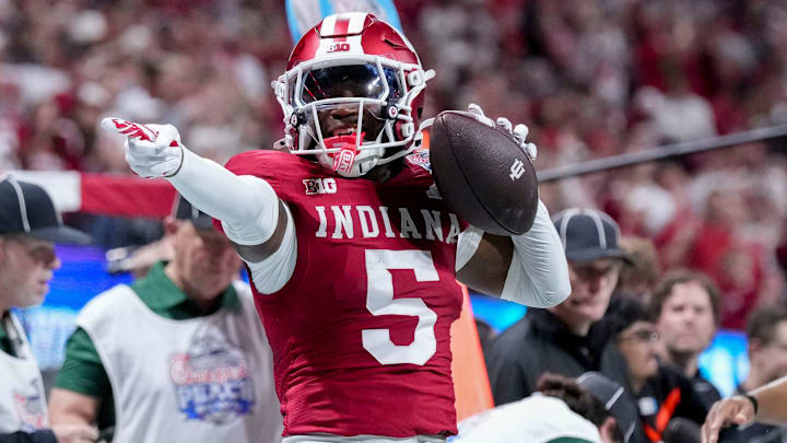 Indiana Hoosiers defensive back D'Angelo Ponds (5) celebrates after rushing the ball Friday, Jan. 9, 2026, during the Peach Bowl and semifinal game of the College Football Playoff against the Oregon Ducks at Mercedes-Benz Stadium in Atlanta. Indiana Hoosiers defensive back D'Angelo Ponds (5) celebrates after rushing the ball Friday, Jan. 9, 2026, during the Peach Bowl and semifinal game of the College Football Playoff against the Oregon Ducks at Mercedes-Benz Stadium in Atlanta.