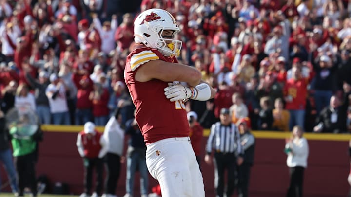Nov 22, 2025; Ames, Iowa, USA; Iowa State Cyclones tight end Benjamin Brahmer (18) catches a touchdown pass in their game with the Kansas Jayhawks during the second half at Jack Trice Stadium. Mandatory Credit: Reese Strickland-Imagn Images