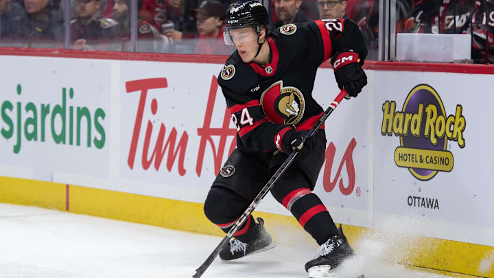 Dec 5, 2024; Ottawa, Ontario, CAN; Ottawa Senators defenseman Jacob Bernard-Docker (24) controls the puck in the second period against the Detroit Red Wings at the Canadian Tire Centre. Mandatory Credit: Marc DesRosiers-Imagn Images Dec 5, 2024; Ottawa, Ontario, CAN; Ottawa Senators defenseman Jacob Bernard-Docker (24) controls the puck in the second period against the Detroit Red Wings at the Canadian Tire Centre. Mandatory Credit: Marc DesRosiers-Imagn Images