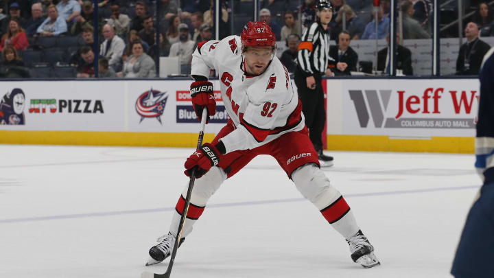 Apr 16, 2024; Columbus, Ohio, USA; Carolina Hurricanes center Evgeny Kuznetsov (92) passes the puck against the Columbus Blue Jackets during the first period at Nationwide Arena. Mandatory Credit: Russell LaBounty-USA TODAY Sports
