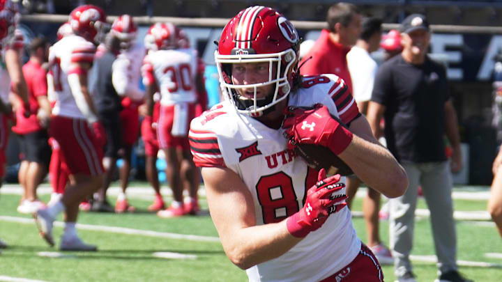 September 14 2024: Utes tight end Caleb Lohner (84) catching a pass before the game with Utah Utes and Utah State held at Merlin Olson Field in Logan Ut. September 14 2024: Utes tight end Caleb Lohner (84) catching a pass before the game with Utah Utes and Utah State held at Merlin Olson Field in Logan Ut.
