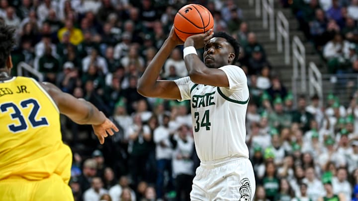 Michigan State's Xavier Booker makes a 3-pointer against Michigan during the first half on Tuesday,