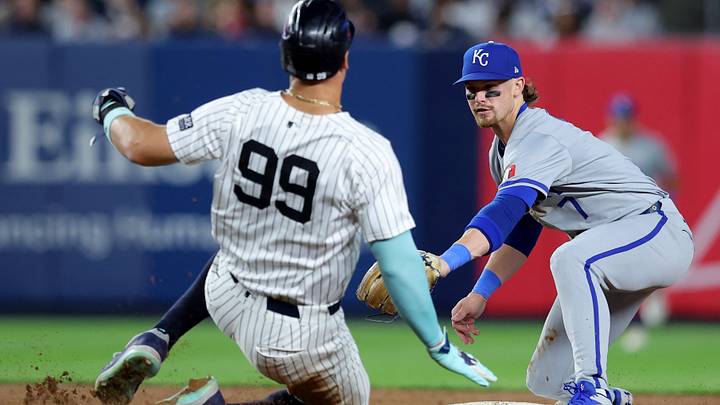 Sep 9, 2024; Bronx, New York, USA; Kansas City Royals shortstop Bobby Witt Jr. (7) tags out New York Yankees designated hitter Aaron Judge (99) at second base to complete a double play on a ball hit by Yankees catcher Austin Wells (not pictured) during the fifth inning at Yankee Stadium. Mandatory Credit: Brad Penner-Imagn Images Sep 9, 2024; Bronx, New York, USA; Kansas City Royals shortstop Bobby Witt Jr. (7) tags out New York Yankees designated hitter Aaron Judge (99) at second base to complete a double play on a ball hit by Yankees catcher Austin Wells (not pictured) during the fifth inning at Yankee Stadium. Mandatory Credit: Brad Penner-Imagn Images