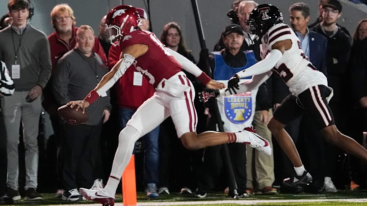 Arkansas' Taylen Green (10) runs in for a touchdown during the AutoZone Liberty Bowl between Arkansas and Texas Tech in Memphis, Tenn., on Friday, December 27, 2024.