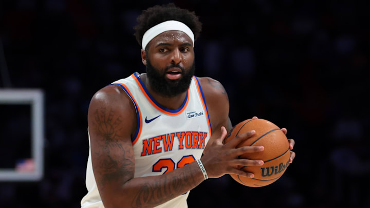 Nov 17, 2025; Miami, Florida, USA; New York Knicks center Mitchell Robinson (23) protects the basketball against the Miami Heat during the third quarter at Kaseya Center. Mandatory Credit: Sam Navarro-Imagn Images Nov 17, 2025; Miami, Florida, USA; New York Knicks center Mitchell Robinson (23) protects the basketball against the Miami Heat during the third quarter at Kaseya Center. Mandatory Credit: Sam Navarro-Imagn Images