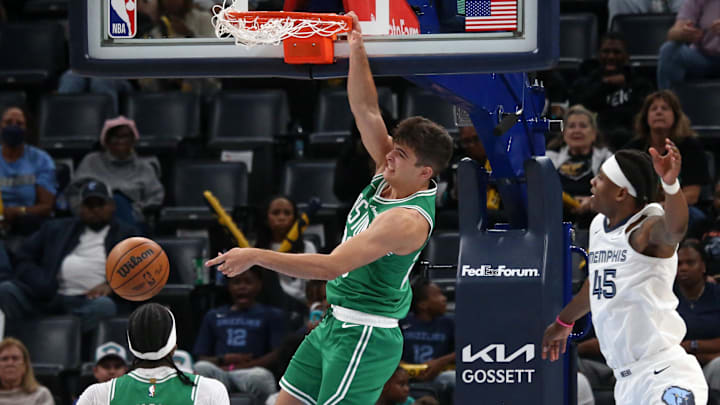 Oct 8, 2025; Memphis, Tennessee, USA; Boston Celtics guard Hugo Gonzalez (28) dunks during the third quarter against the Memphis Grizzlies at FedExForum.