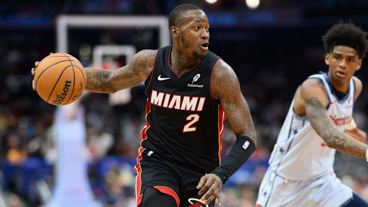 Mar 31, 2025; Washington, District of Columbia, USA; Miami Heat guard Terry Rozier (2) drives to the basket against Washington Wizards guard AJ Johnson (5) during the first quarter at Capital One Arena. Mandatory Credit: Reggie Hildred-Imagn Images Mar 31, 2025; Washington, District of Columbia, USA; Miami Heat guard Terry Rozier (2) drives to the basket against Washington Wizards guard AJ Johnson (5) during the first quarter at Capital One Arena. Mandatory Credit: Reggie Hildred-Imagn Images