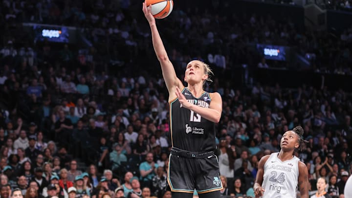 May 17, 2025; Brooklyn, New York, USA; New York Liberty forward Leonie Fiebich (13) drives to the basket in the fourth quarter against the Las Vegas Aces at Barclays Center. Mandatory Credit: Wendell Cruz-Imagn Images May 17, 2025; Brooklyn, New York, USA; New York Liberty forward Leonie Fiebich (13) drives to the basket in the fourth quarter against the Las Vegas Aces at Barclays Center. Mandatory Credit: Wendell Cruz-Imagn Images
