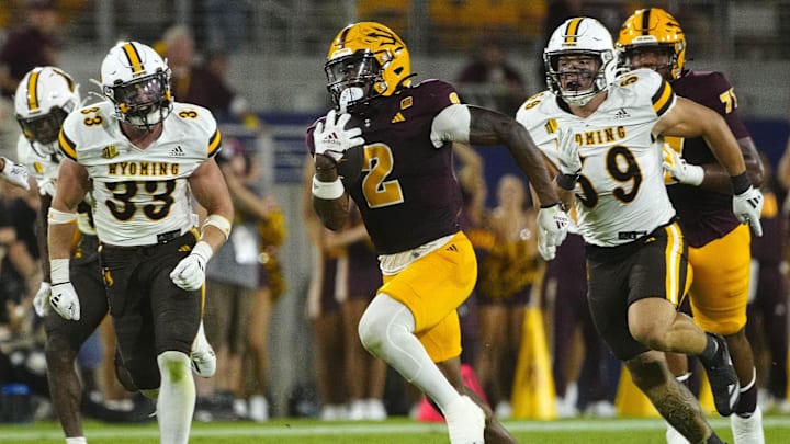 August 31, 2024; Tempe, Ariz.; USA; ASU runningback Kyson Brown (2) sprints upfield against Wyoming during a game at Sun Devil Stadium. August 31, 2024; Tempe, Ariz.; USA; ASU runningback Kyson Brown (2) sprints upfield against Wyoming during a game at Sun Devil Stadium.