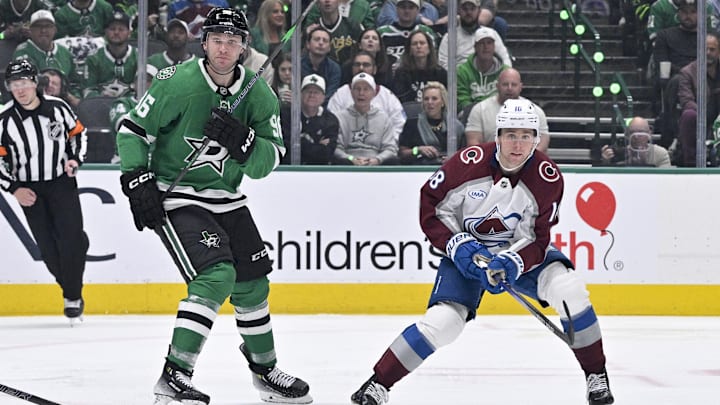 Apr 21, 2025; Dallas, Texas, USA; Dallas Stars right wing Mikko Rantanen (96) and Colorado Avalanche center Jack Drury (18) in action during the game between the Dallas Stars and the Colorado Avalanche in game two of the first round of the 2025 Stanley Cup Playoffs at American Airlines Center. Mandatory Credit: Jerome Miron-Imagn Images
